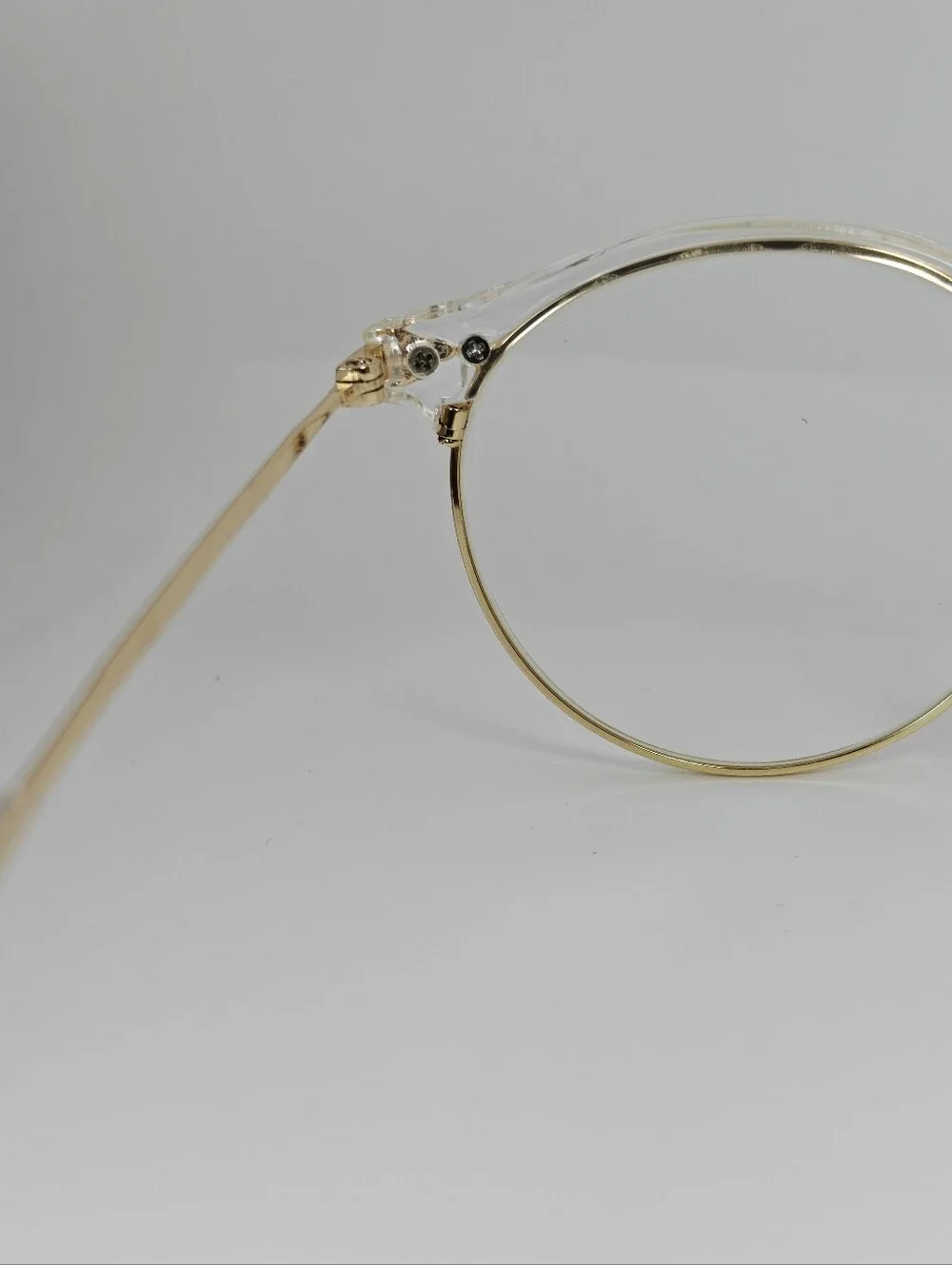 Moon River. Elegant. Round Gold Metal Frame Glasses. Details.